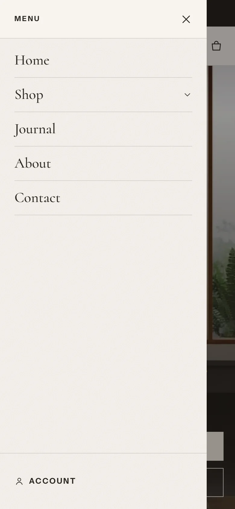 The menu drawer on a phone, with the main menu items Home, Shop, Journal, About and Contact, and an Account link at the bottom