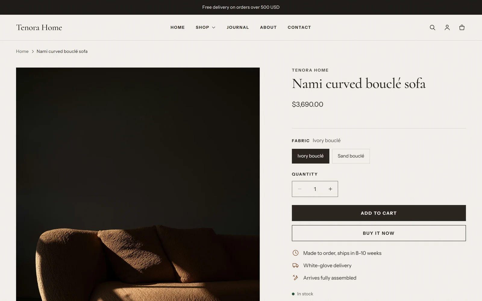 A Tenora product page for a curved bouclé sofa, with the product image, title, price, fabric options, quantity, add to cart button and delivery details